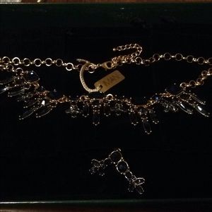 Gold tone Iman Necklace with blue stones